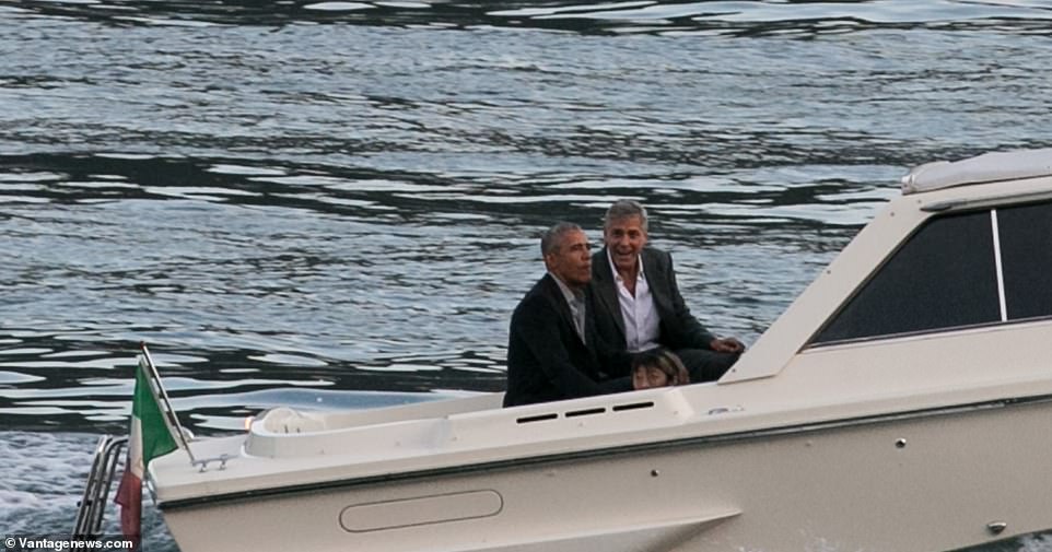 15161360-7172965-George_Clooney_right_and_Barack_Obama_left_sail_on_a_boat_on_Ita-a-1_1561337271486.jpg