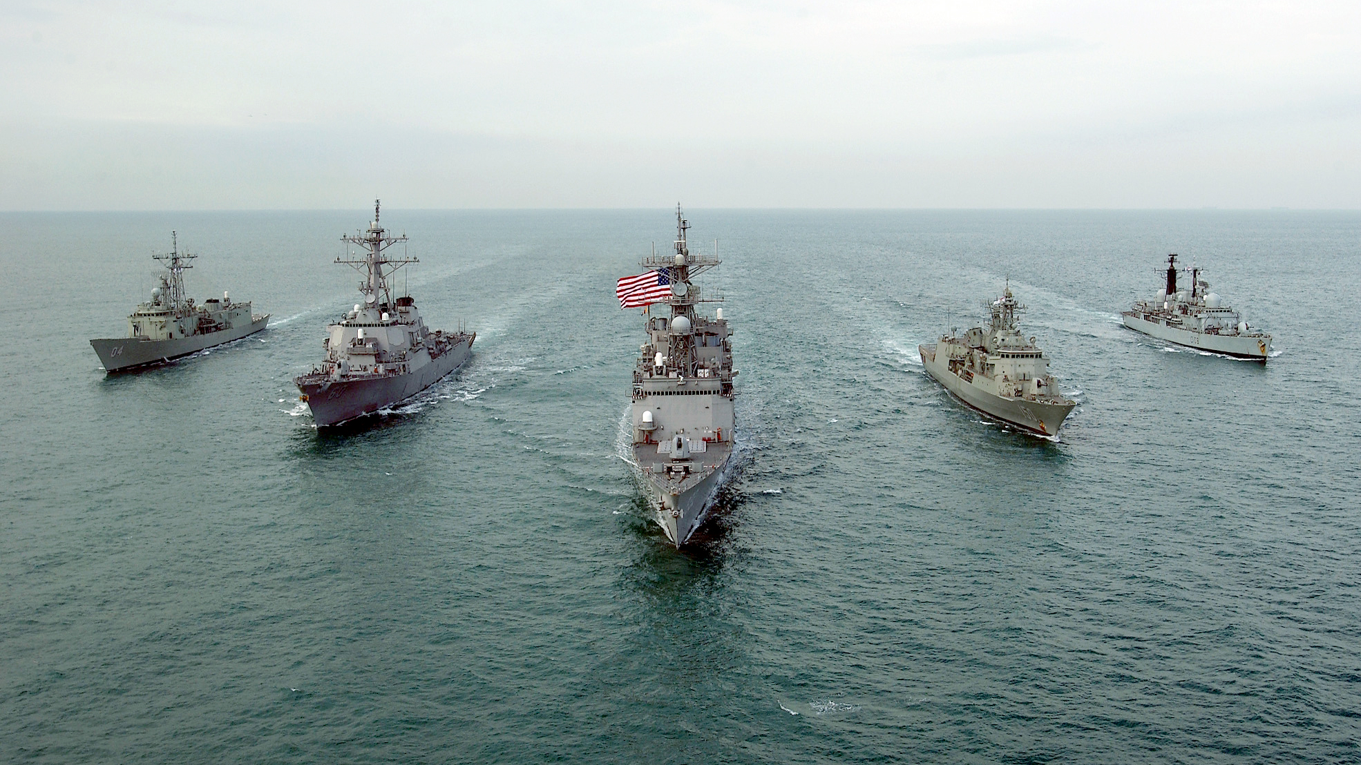 021216-N-5319A-003 - Central Command AOR - Her Majesty's Australian Ship HMAS DARWIN (F 04), USS PAUL HAMILTON (DDG 60), USS FLETCHER (DD 992), HMAS ANZAC (F 150), and Her Majesty's Ship HMS CARDIFF (D 108) conducting (MIO) Maritime Interdiction Operations in the Arabian Gulf take time to cruise in formation for a photography exercise. The fore mentioned ships are in the Central Command AOR in support of Operation Enduring Freedom and in accordance with Security Council resolutions. Official U.S. Navy Photograph by: Photographers Mate First Class PH1 Brien Aho; Fleet Combat Camera, AtlanticFor Official Use Only (FOUO) NOT CLEARED FOR PUBLIC RELEASE by CDR. Jeff Alderson, COMUSNAVCENT/ 5TH Fleet PAO.