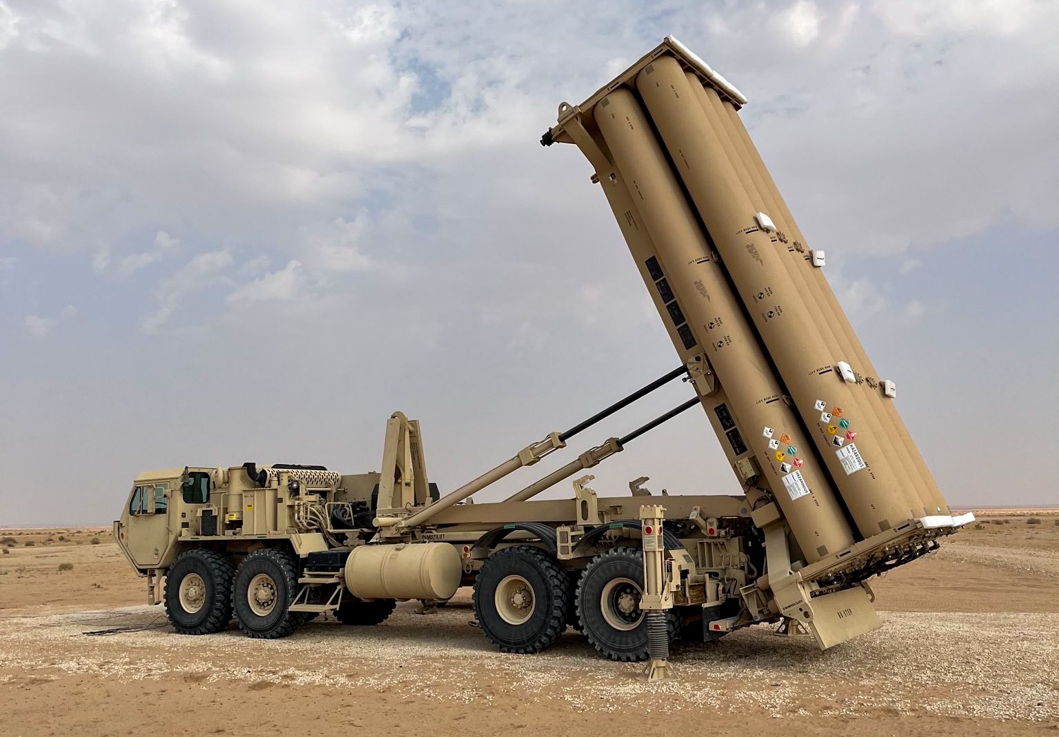 A Terminal High Altitude Area Defense (THAAD) launcher emplaced and prepared to launch interceptors to counter ballistic missile threats at an undisclosed location in CENTCOM area of responsibility. THAAD is an important component of the integrated air and missile defense network that defends critical assets in the CENTCOM area of responsibility amidst needs for increased force protection. (U.S. Army Courtesy Photo)