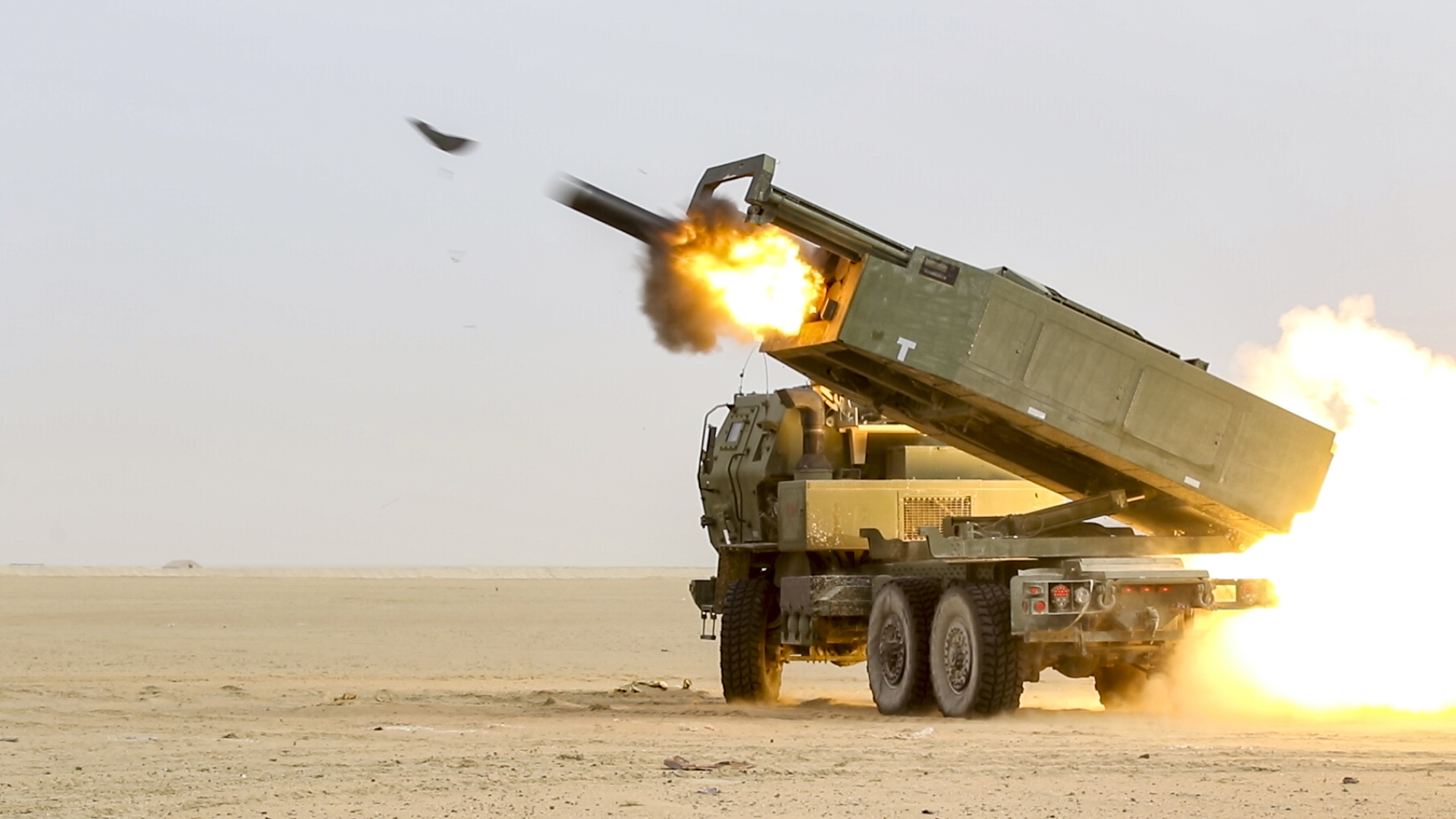 U.S. Soldiers assigned to the 65th Field Artillery Brigade fire a High Mobility Artillery Rocket System (HIMARS) during a joint live-fire exercise with the Kuwait Land Forces, Jan. 8, 2019, near Camp Buehring, Kuwait. The U.S. and Kuwaiti forces train together frequently to maintain a high level of combat readiness and to maintain effective communication between the two forces. (U.S. Army photo by Sgt. Bill Boecker)