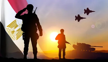 militarry-silhouettes-against-the-sunset-vector-47737874.webp
