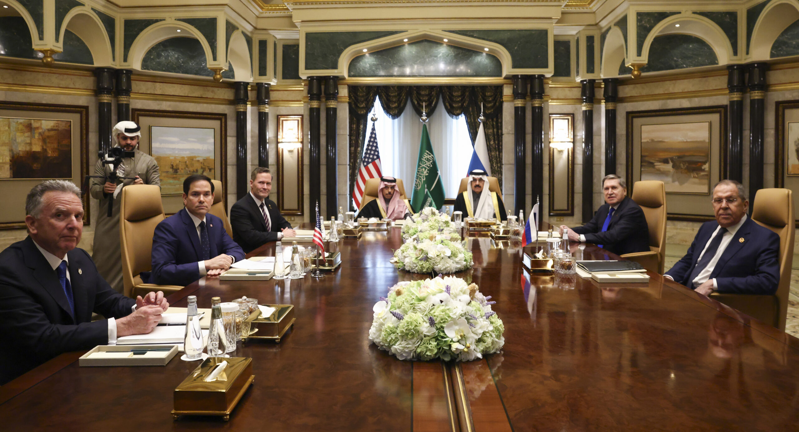 U.S. Secretary of State Marco Rubio, second left, meets with Saudi Foreign Minister Prince Faisal bin Farhan Al Saud, Saudi National Security Advisor Mosaad bin Mohammad Al-Aiban, U.S. National Security Advisor Mike Waltz, third left, U.S. Middle East envoy Steve Witkoff, left, Russian Foreign Minister Sergei Lavrov, right, and Russian President Vladimir Putin's foreign policy advisor Yuri Ushakov, second right, at Diriyah Palace, in Riyadh, Saudi Arabia, Tuesday Feb. 18, 2025. (Evelyn Hockstein/Pool Photo via AP)