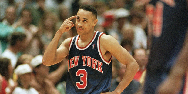 The New York Knicks John Starks (3) puts his finger to his head after losing possession of the ball late in the fourth quarter of Game 6 of the NBA Finals, Sunday, June 19, 1994, Houston, Tex. The Rockets beat the Knicks 86-84 to even the best-of-seven series at 3-3. (AP Photo/David J. Phillip)
